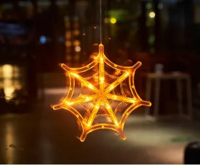 Halloween window hanging LED lights with spider, pumpkin and ghost designs on suction cups