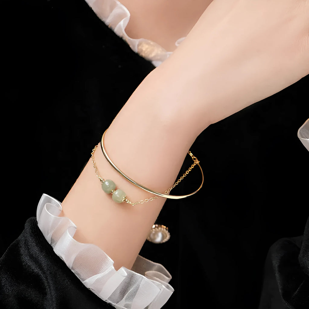 Women's jade lucky beads bracelet with gold inlay decoration in single, double and three beads versions