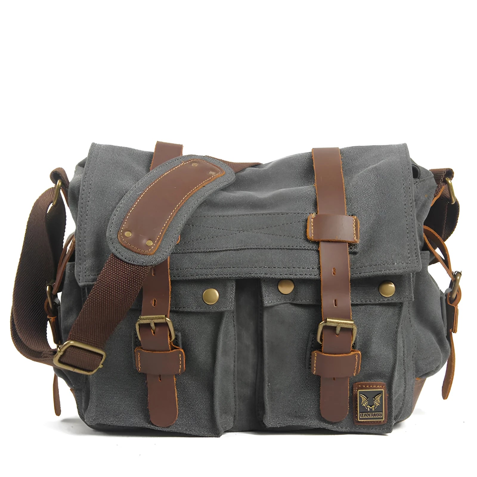 Men's brown canvas crossbody shoulder bag with leather trim shown open, revealing internal organiser pockets.