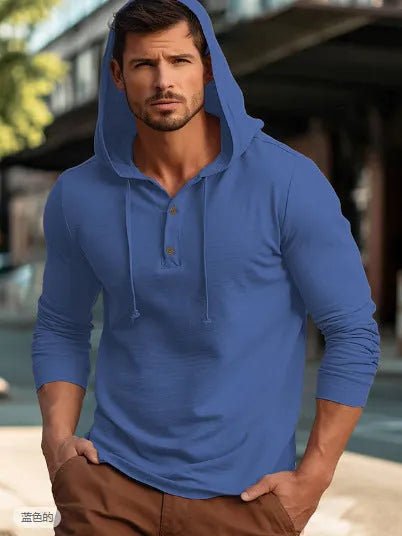 Cotton pullover sports hoodie in apricot colour on a hanger.