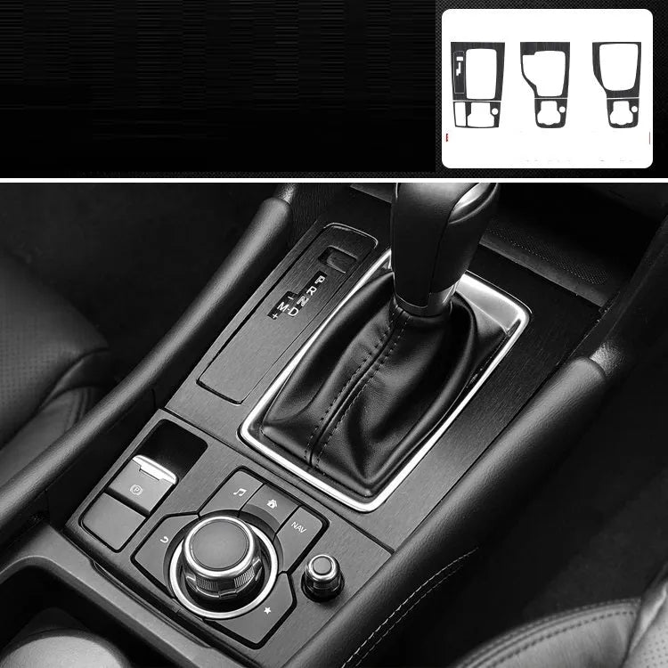 Car interior decorative film sticker kit showing carbon fibre pattern applied to centre console and dashboard