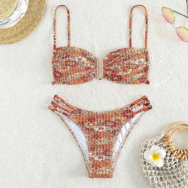 Women's floral bikini swimsuit in orange, blue and rose red colours with high-waist design