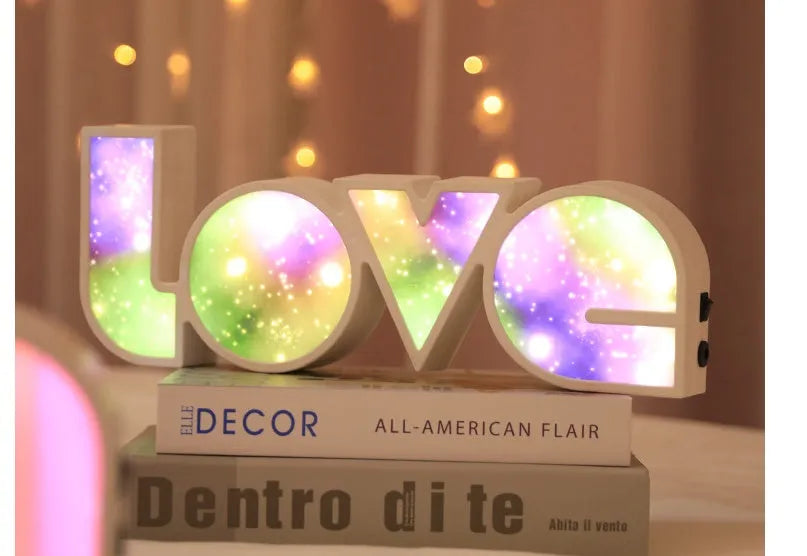 Rainbow style LED LOVE decorative light on a tabletop