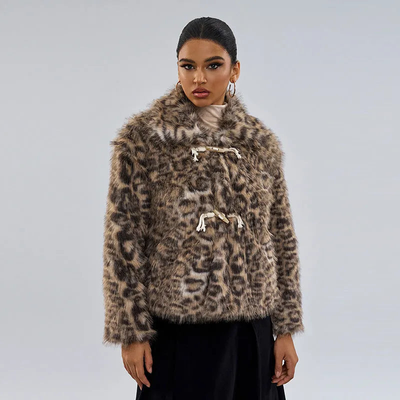 Women's leopard print street fashion coat with regular sleeves on a hanger.