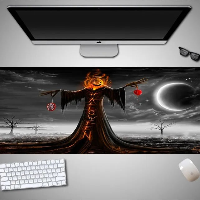Oversized Halloween-themed gaming mouse pad with non-slip base on a desk.
