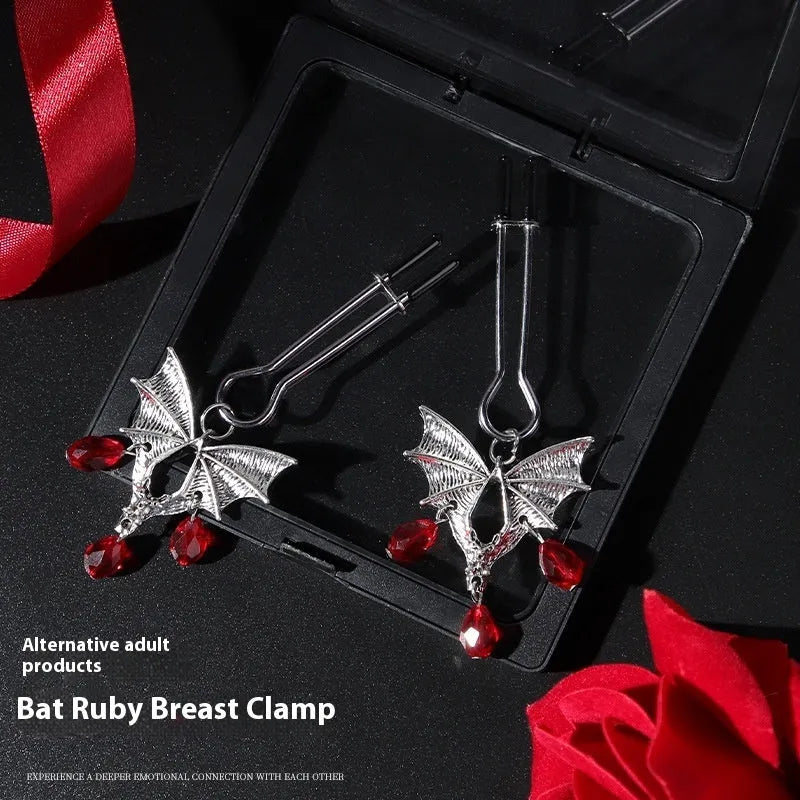 Silver diamond bat nipple clamp adjustable clitoral clip jewellery on black background