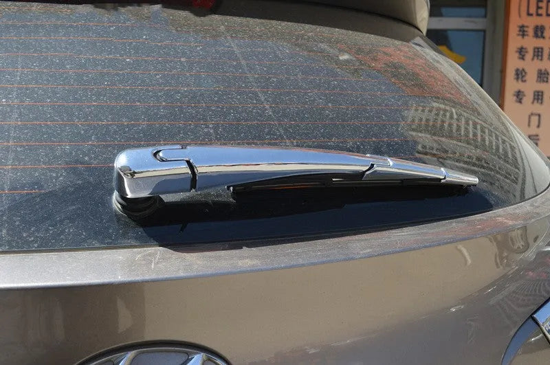 Set of four silvery ABS plastic rear wiper cover trims for 2010 Hyundai cars.