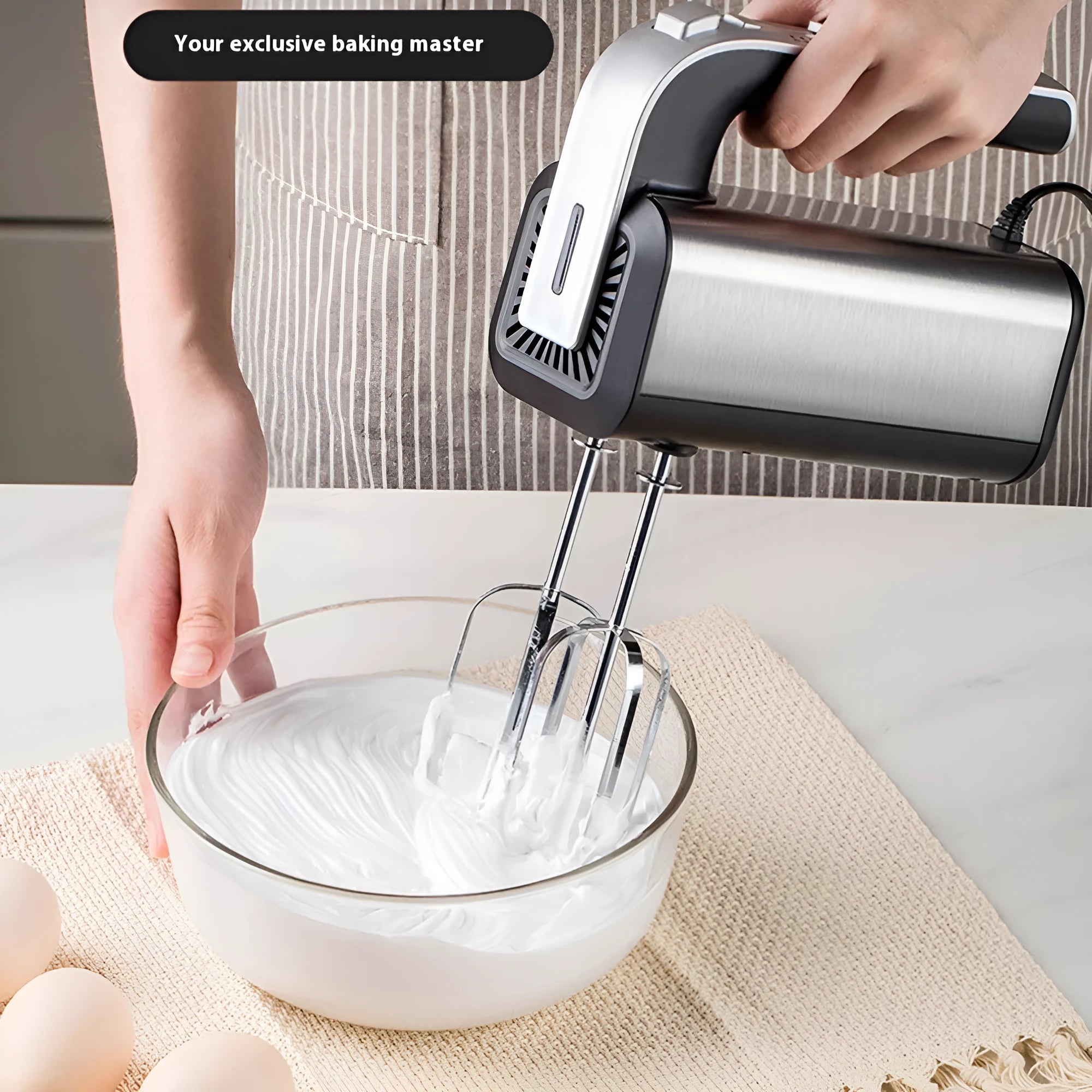 Silver handheld electric kitchen whisk with stainless steel beaters and five-speed control