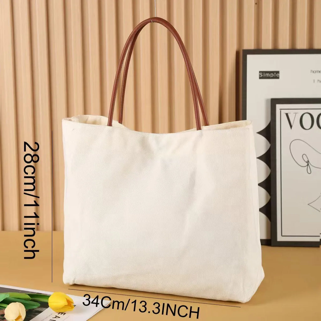 Natural cotton canvas tote bag with zip closure and double shoulder straps in beige white colour