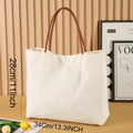 Natural cotton canvas tote bag with zip closure and double shoulder straps in beige white colour