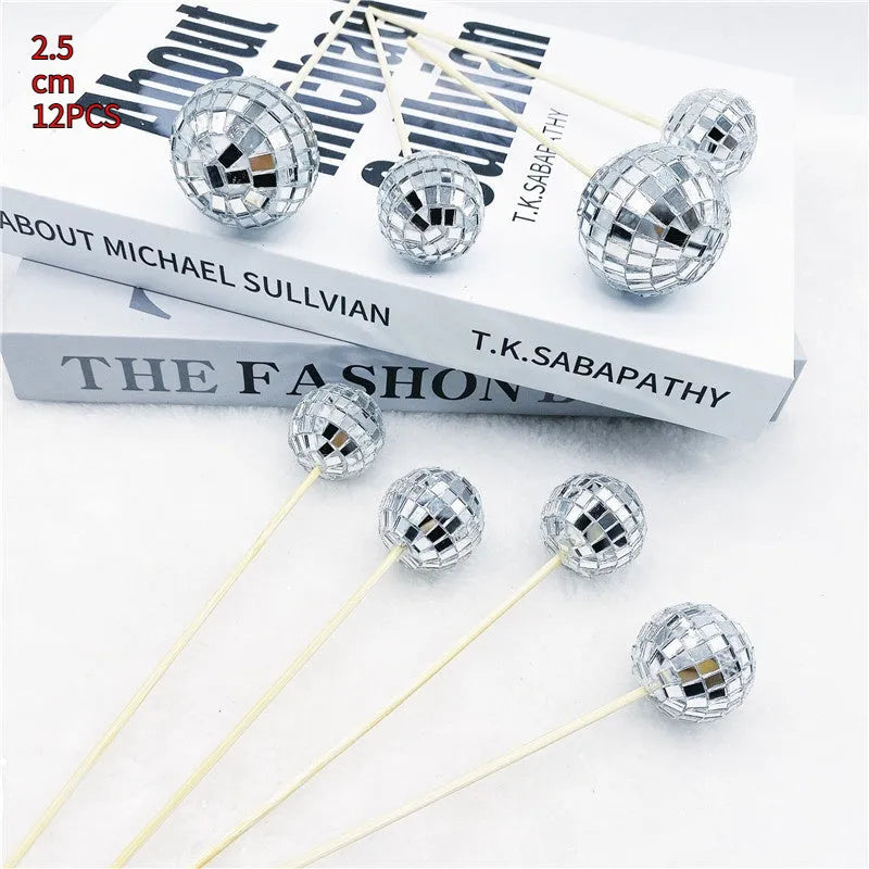 Glass disco ball cake decoration on wooden stick available in four sizes from 2.5cm to 5cm diameter