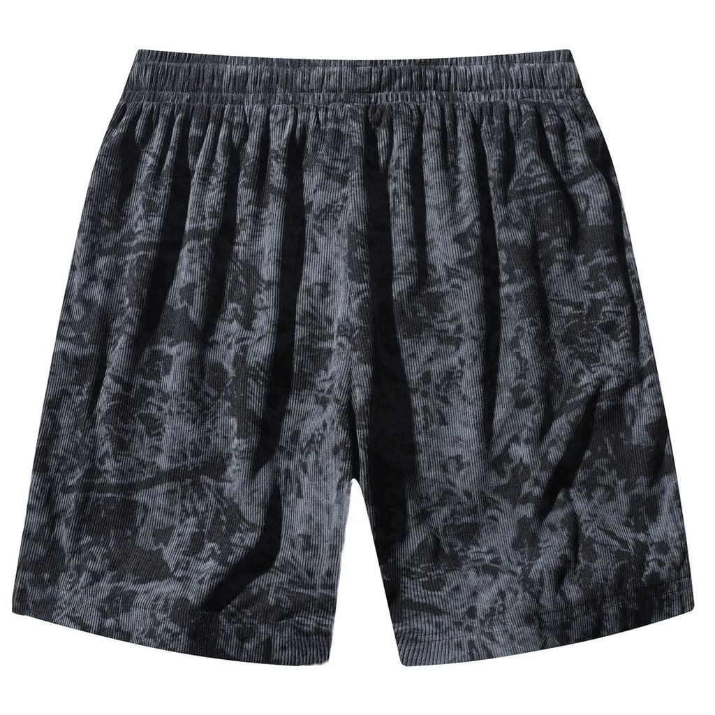 Men's camouflage patterned corduroy shorts with elastic high waistband in straight leg cut.