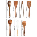Wooden kitchen utensil set showing spoon, spatula and soup spoon in boxed packaging