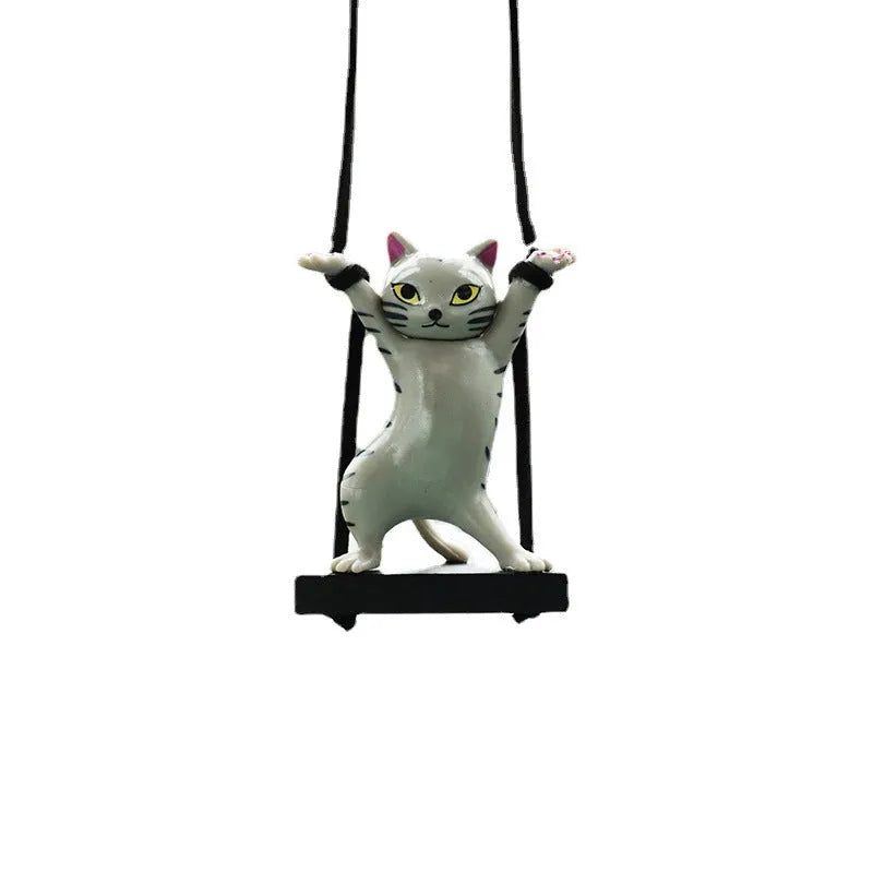 Cartoon-style resin cat pendant on a rope for car interior decoration