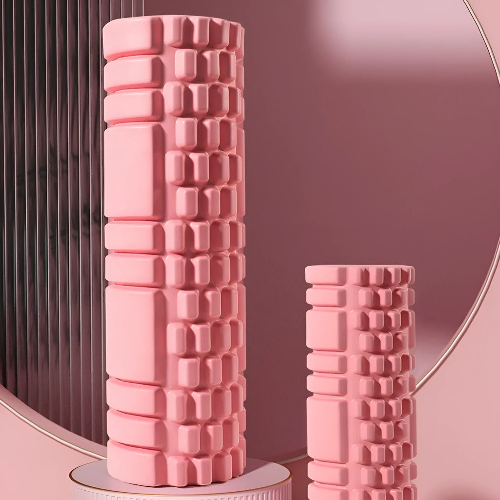 A black EVA foam roller for fitness and muscle recovery, shown next to a grey and pink version.