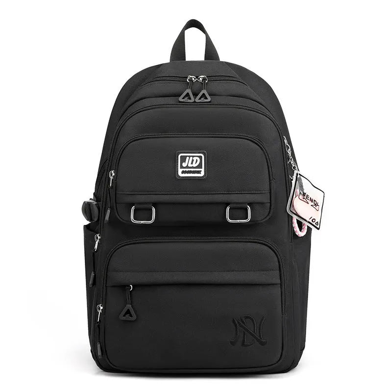 Large capacity nylon school backpack for girls in a choice of colours and patterns, showing ergonomic backplate.