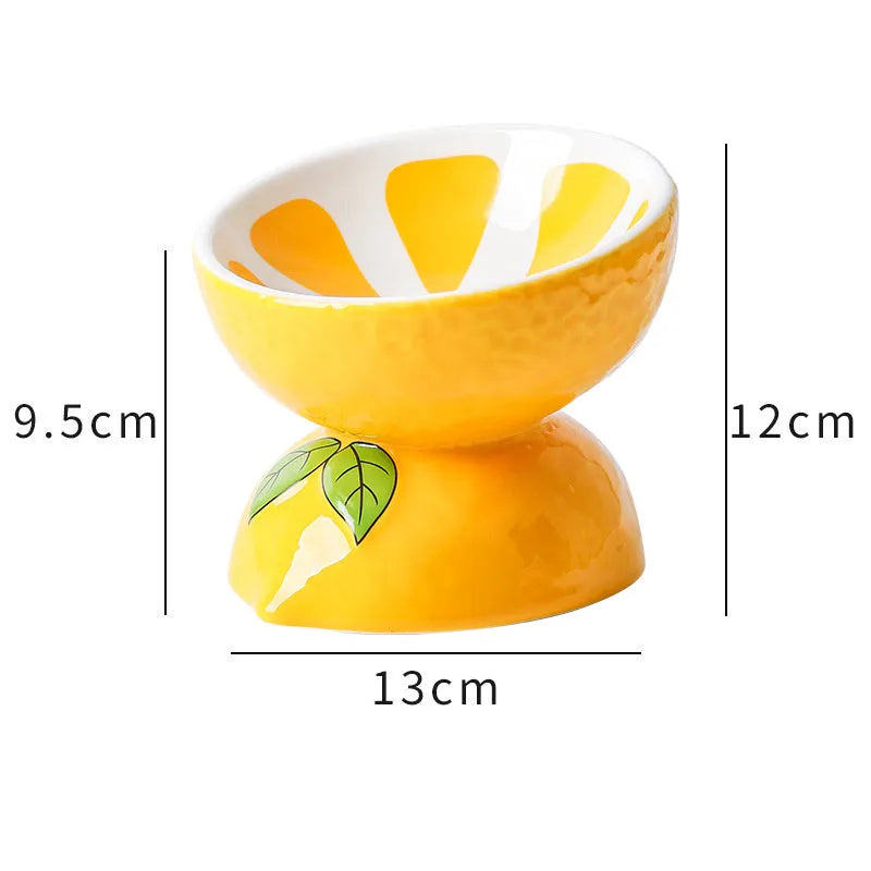 Orange patterned ceramic raised cat bowl with wide tilted dish on non-slip base.