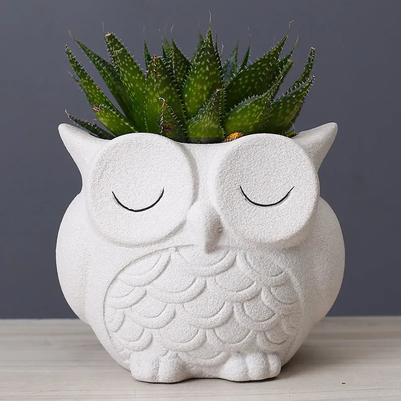 Handmade frosted ceramic owl flower pot in light pink for small succulents.