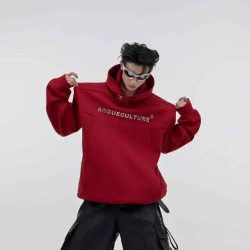 Men's black hooded sweater with metal-effect printing detail and structural shoulder pads