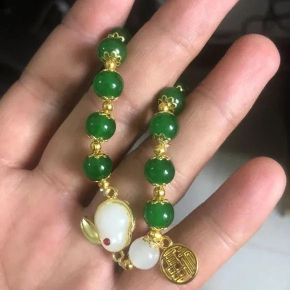 Chinese style bamboo leaf glass bracelet for women with a bamboo joint design.