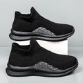 Popcorn Flyknit fabric low-top casual sneaker in white, black, or blue with a flat heel.