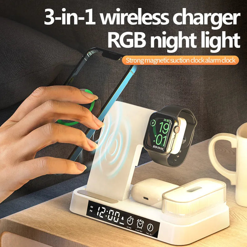 White 4-in-1 foldable wireless charging station showing phone charging on stand, with alarm clock display and RGB night light glow.