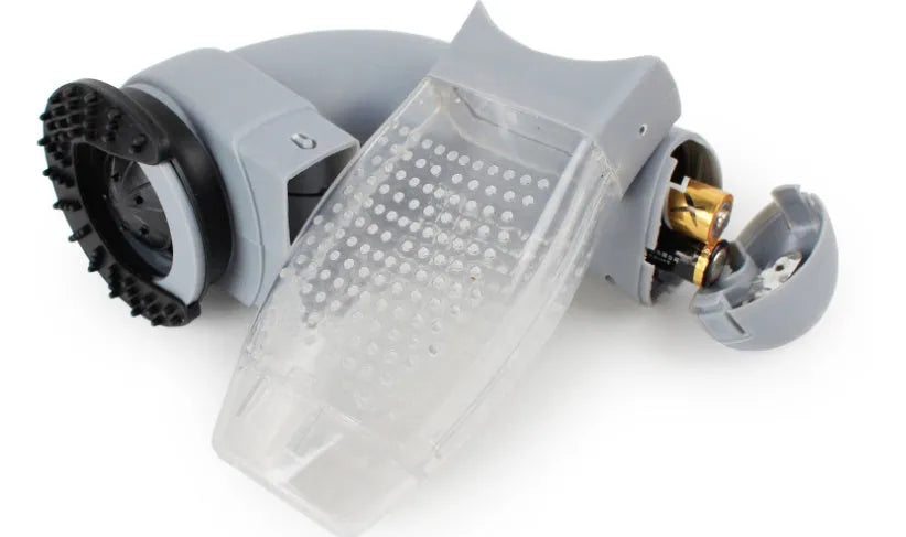 Grey portable electric pet hair vacuum cleaner with soft rubber head for dogs and cats.