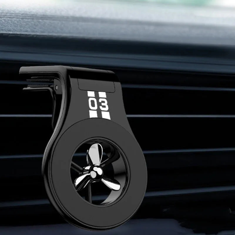 Magnetic car phone holder mounted on air vent with smartphone attached