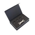Black Bluetooth automotive tyre pressure monitoring system with four external sensors and a wrench.