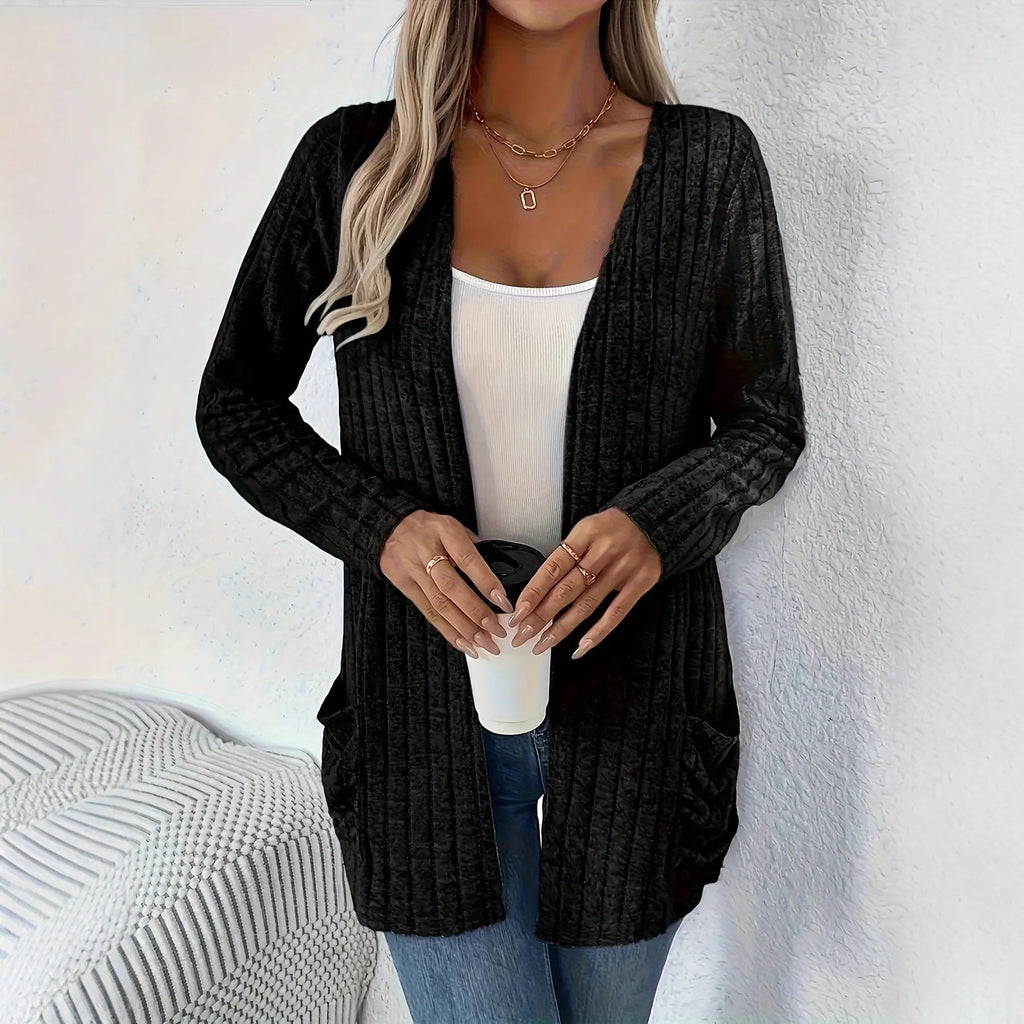Solid colour long sleeve cardigan with front pockets in loose oversized fit