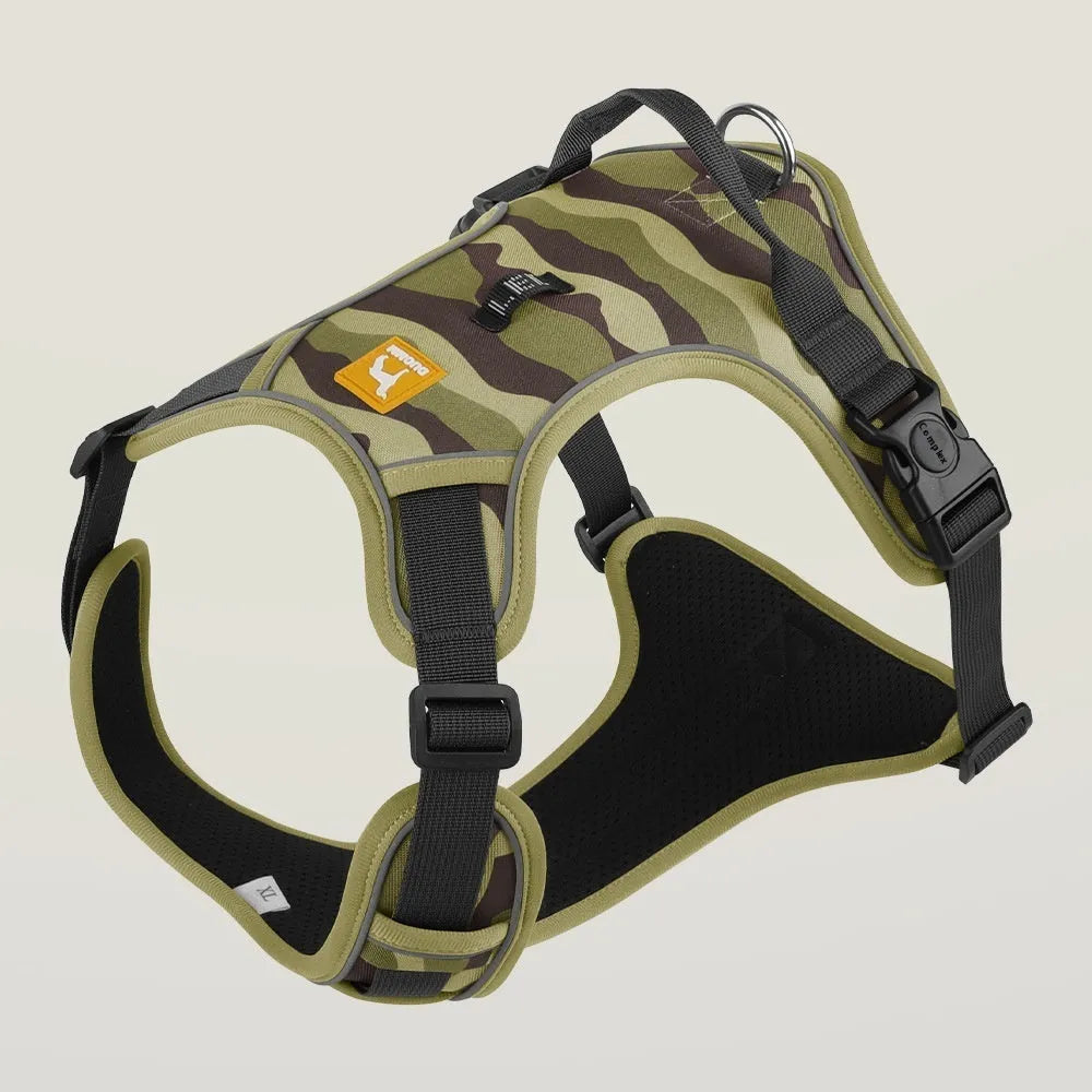 Orange reflective dog chest and back harness with hand-holding rope on a neutral background.