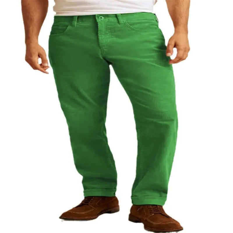 Corduroy straight-leg trousers in green displayed flat showing mid-waist design and zip fly