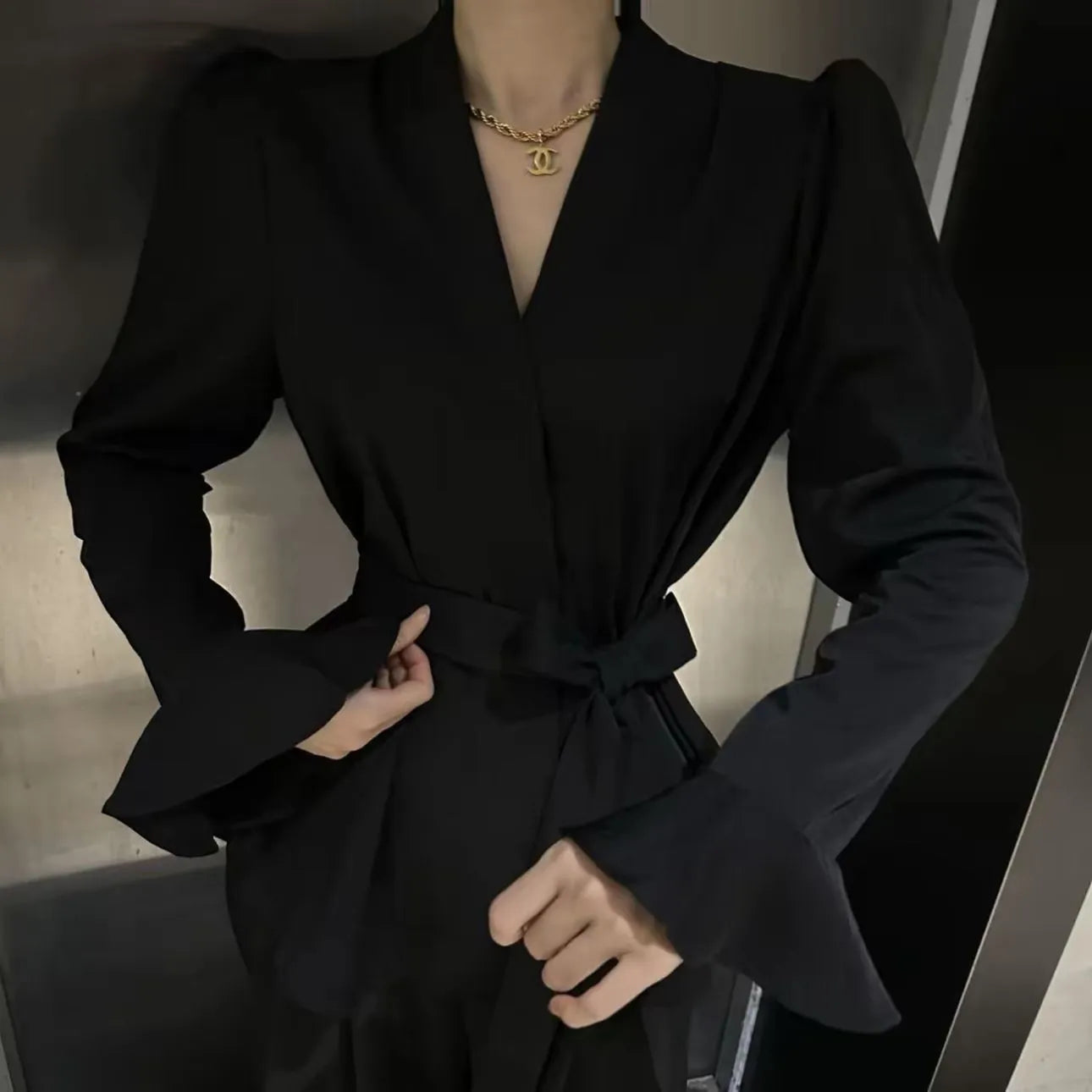 Women's French-style long sleeve shirt with irregular collar and bell sleeves in wine red.