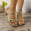 Light brown Velcro Roman sandals with an adjustable strap and rubber sole
