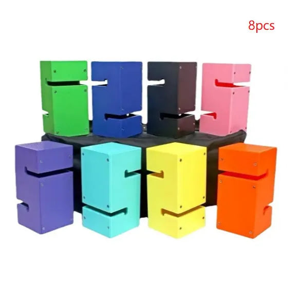 Set of coloured ABS plastic blocks, ropes, and a frame for outdoor group building games and team challenges.
