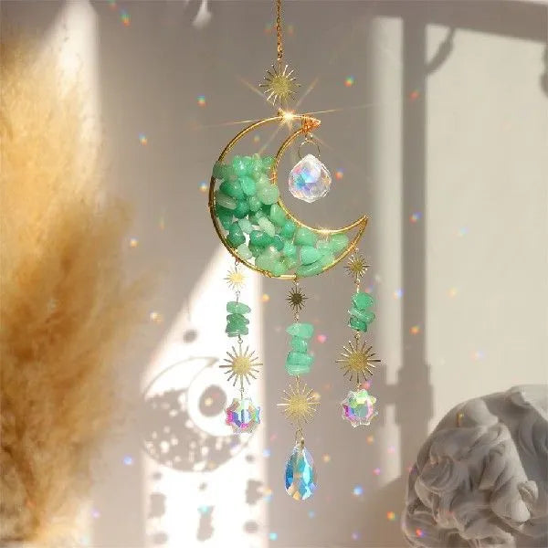 Crystal car pendant with moon design hanging from rear-view mirror