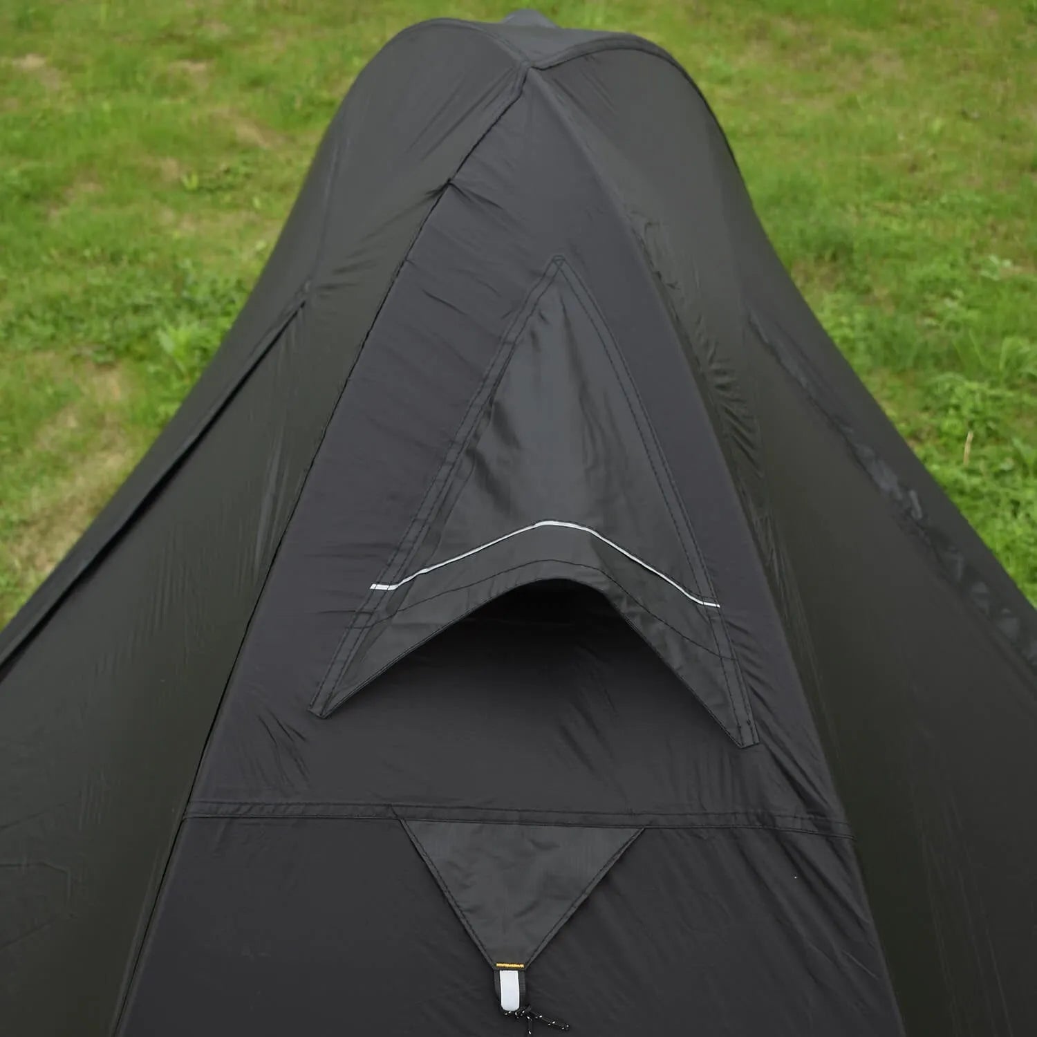 Single person tent with aluminium poles in black colour showing double account structure and mesh ventilation panels