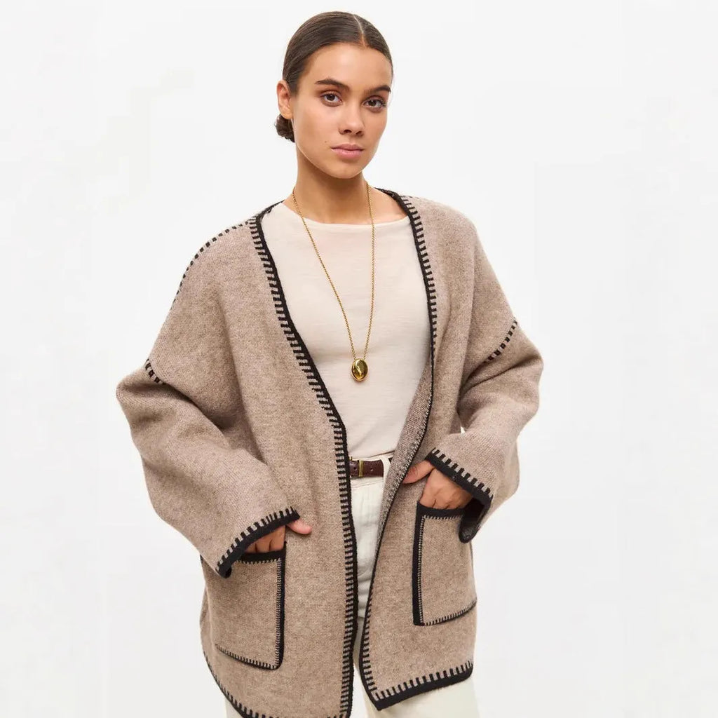 Lace-up front knitted cardigan in black camel or white colours with loose fit and long sleeves