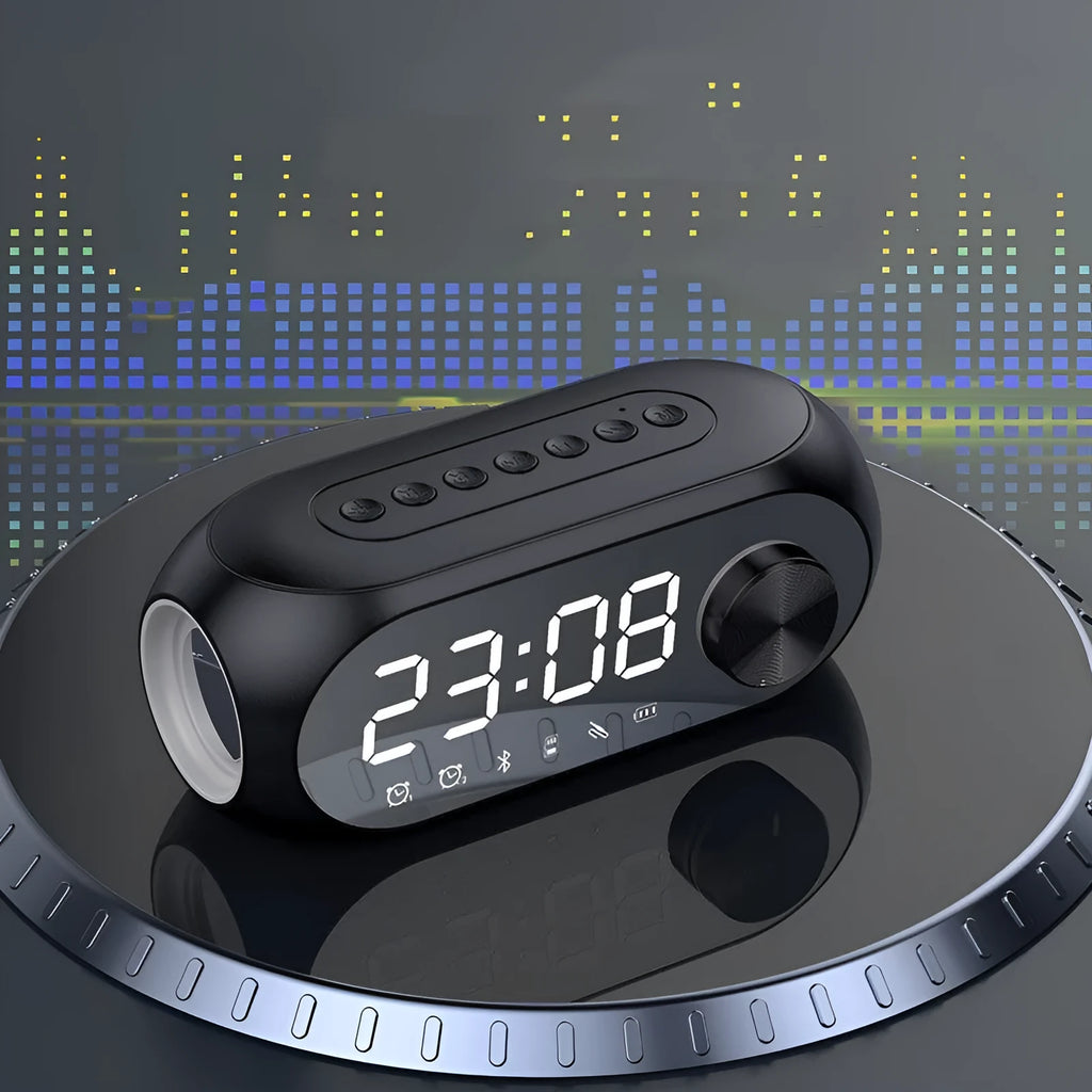 Compact USB-powered portable speaker with extra bass and digital clock display in black, white, or blue colour options.