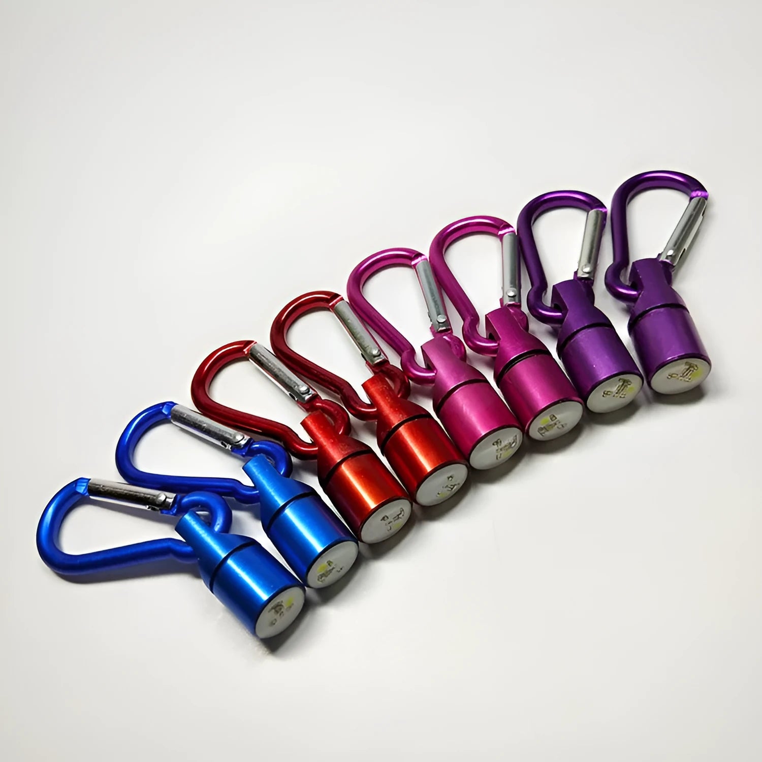 LED pet light in silver with copper alloy body showing 60mm length and 12mm width on a dog collar