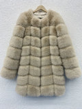Women's long artificial fur coat in black colour showing regular sleeves and full-length design