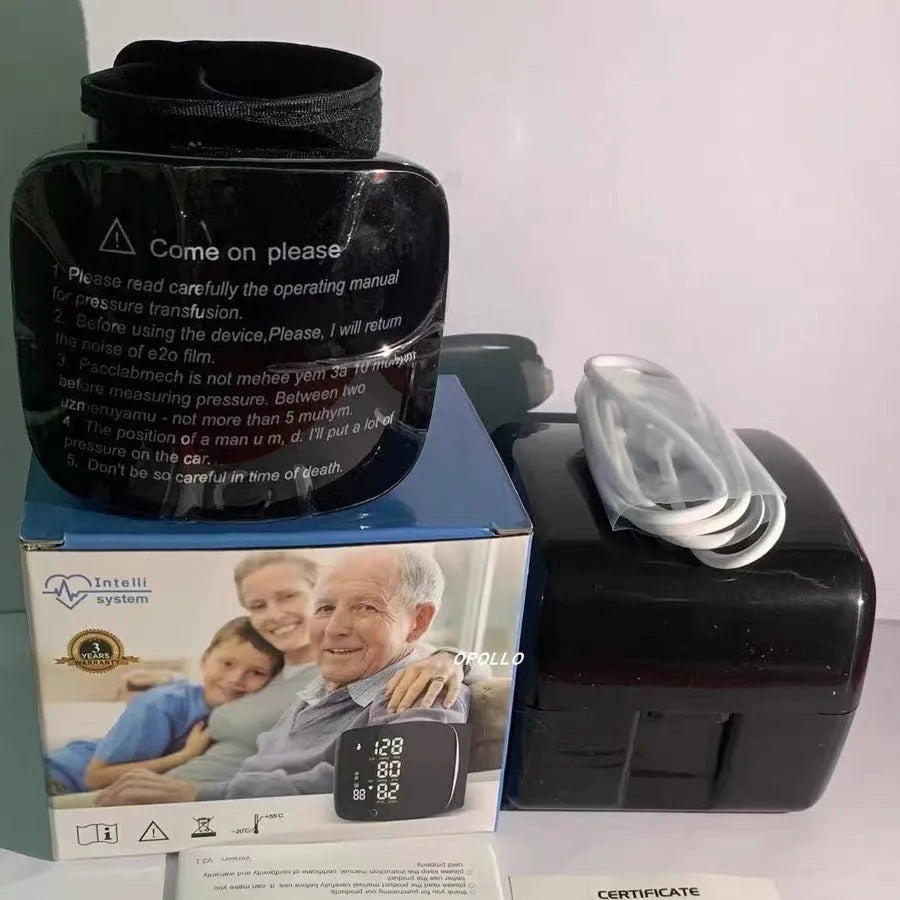 Black wrist blood pressure monitor with USB charging port and display screen