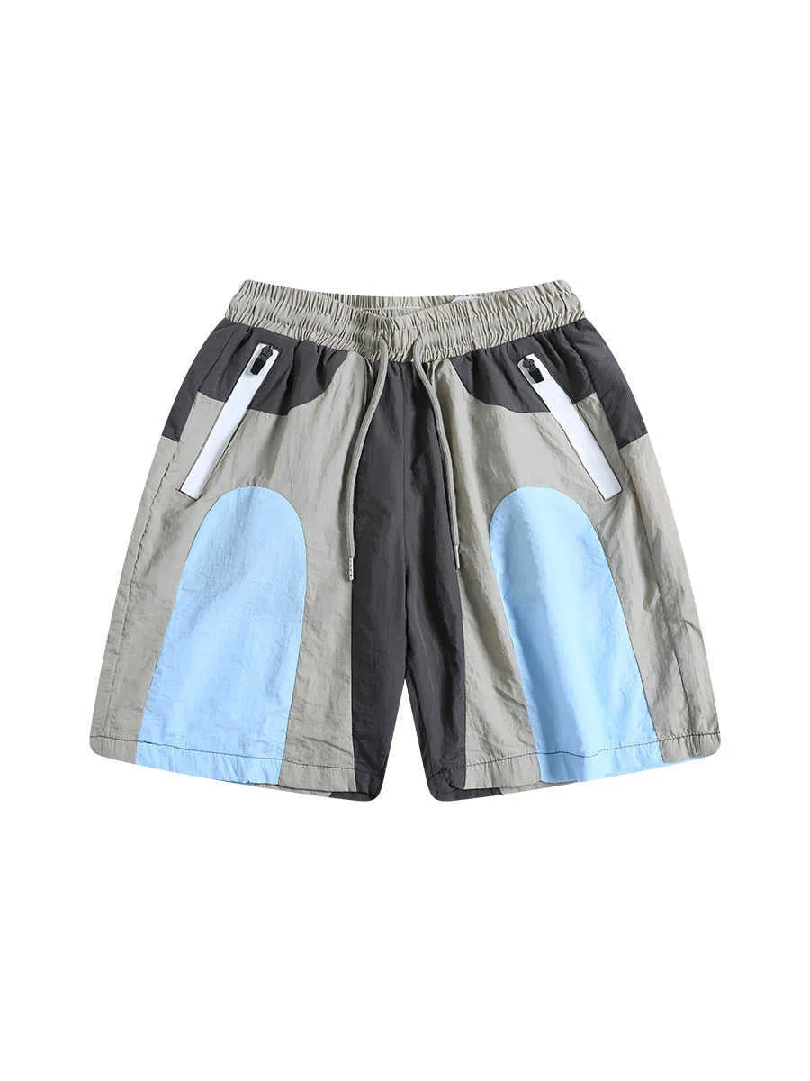 Blue patchwork men's sports shorts with elastic waistband and straight-leg design