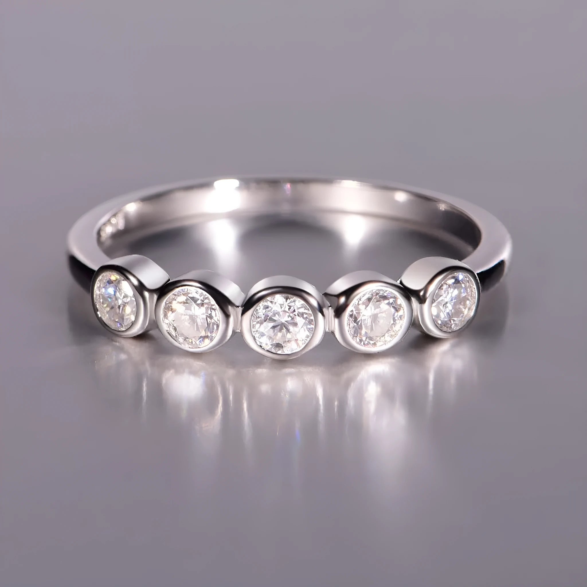 925 silver round moissanite ring with white gold electroplated finish on a geometric band, available in sizes 5 to 9