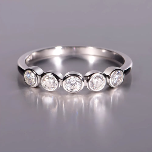 925 silver round moissanite ring with white gold electroplated finish on a geometric band, available in sizes 5 to 9
