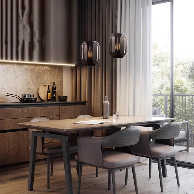 Minimalist Nordic single-light pendant chandelier with glass shade in smoke grey, cognac, or clear colour.