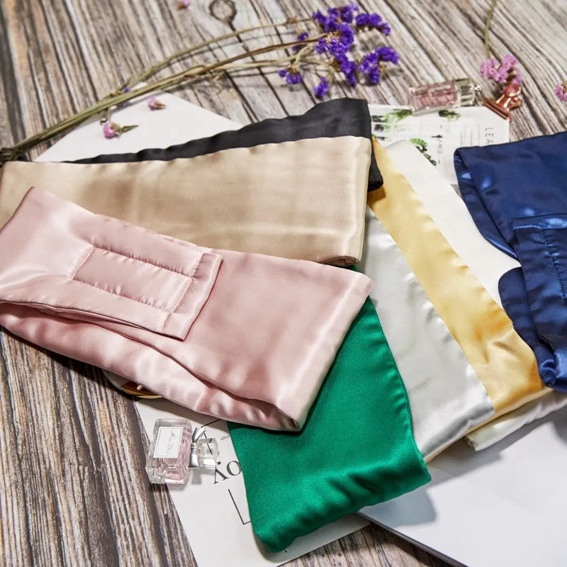 Mulberry silk sleep eye mask shown in multiple colour options on neutral background