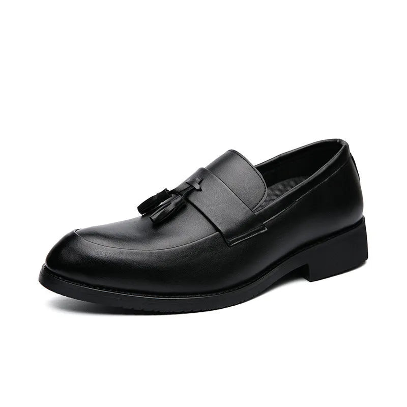 Men's black slip-on loafers with tassel detail and rubber sole for business casual wear