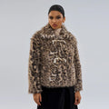 Women's leopard print street fashion coat with regular sleeves on a hanger.