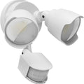 White outdoor LED security floodlight with motion sensor mounted on wall